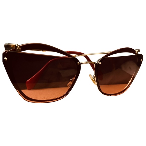 Miu Miu Never used with box and purchase receipt